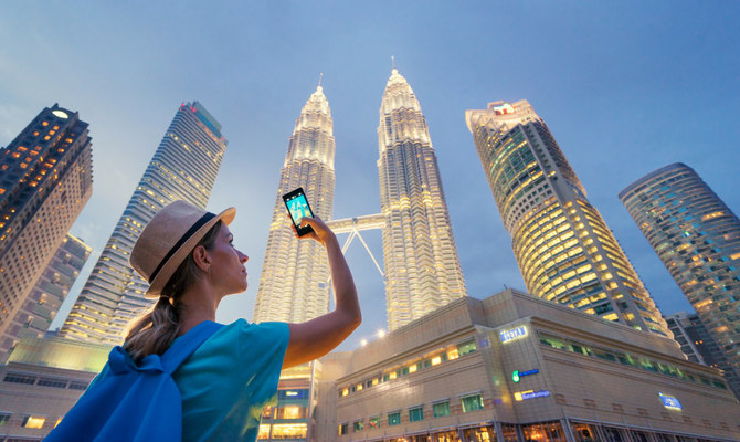 Travel,And,Technology.,Young,Woman,Taking,Photo,With,Her,Smartphone